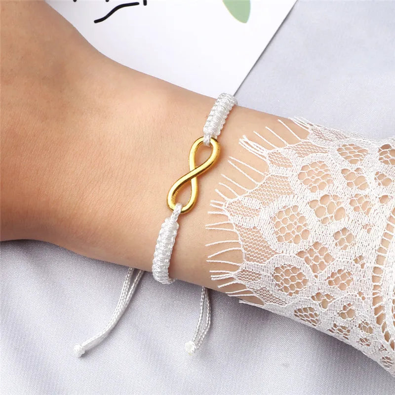 Bracciale Intrecciato Handmade con Charm Infinito – Regolabile