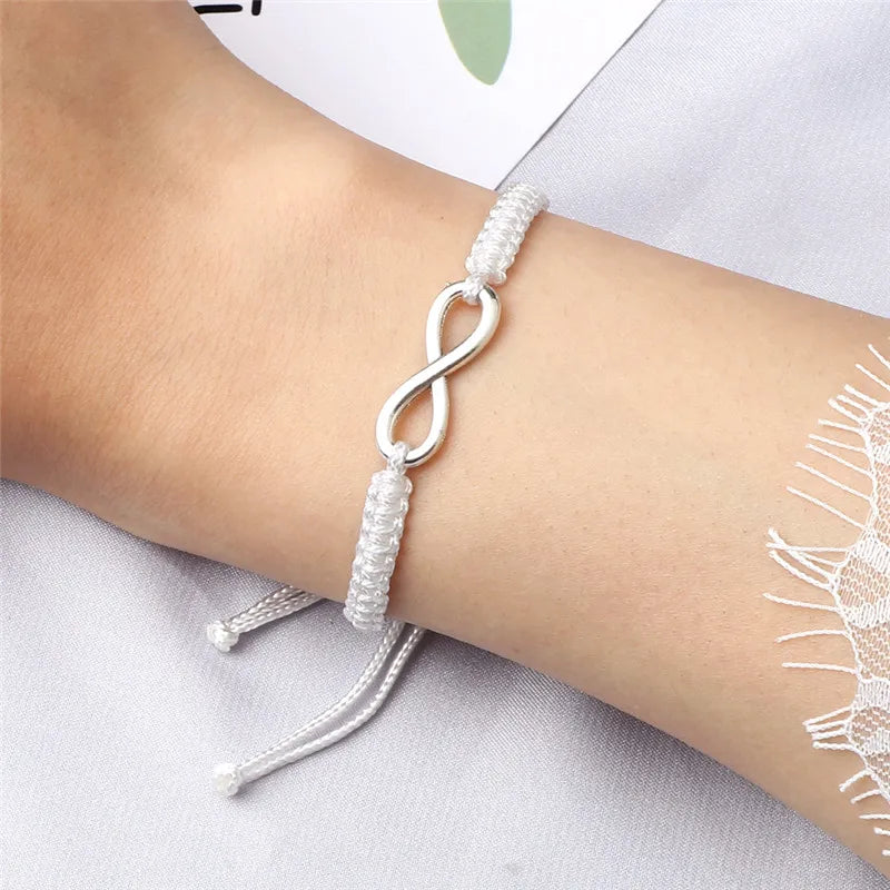 Bracciale Intrecciato Handmade con Charm Infinito – Regolabile