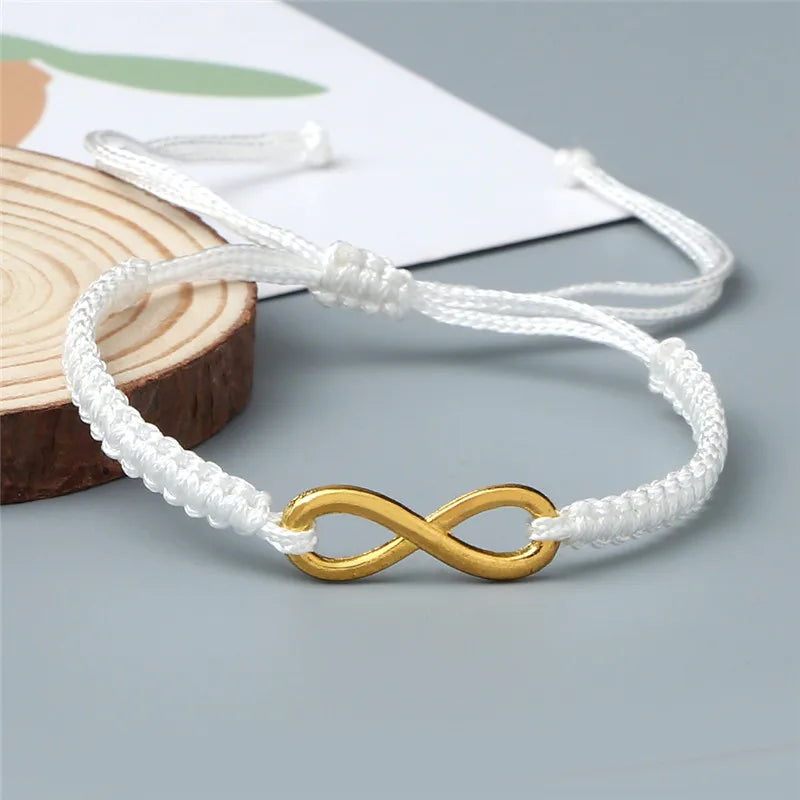 Bracciale Intrecciato Handmade con Charm Infinito – Regolabile