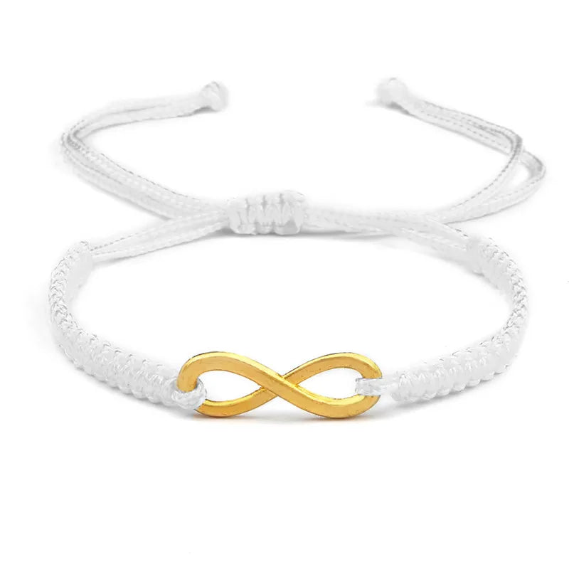Bracciale Intrecciato Handmade con Charm Infinito – Regolabile