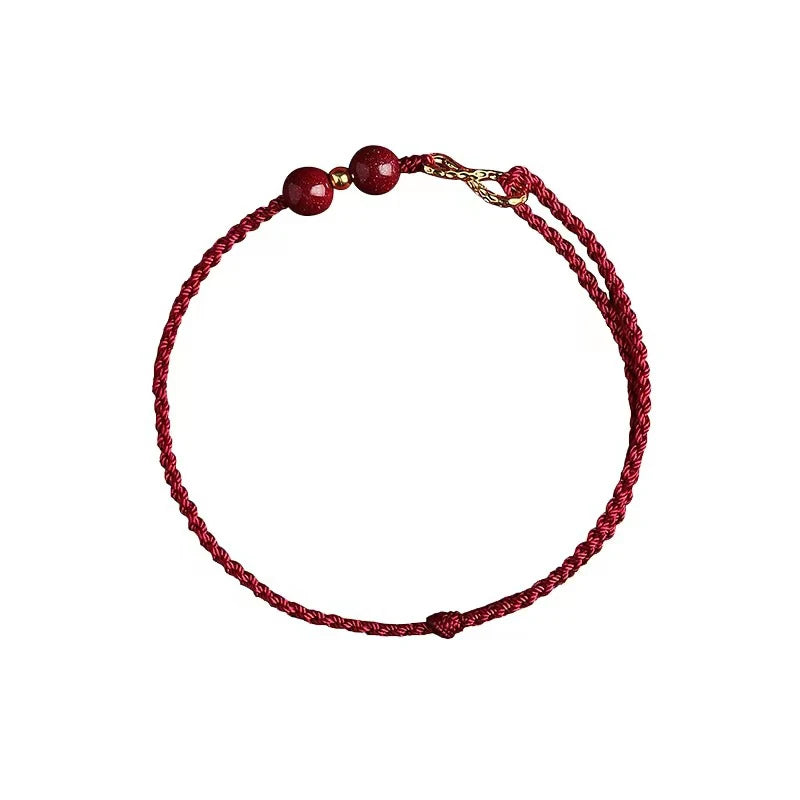 Bracciale Intrecciato Portafortuna – Infinito & Perla Rossa