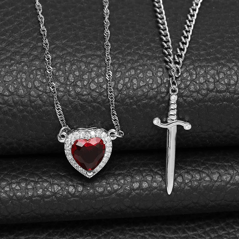 Collane Coppia Cuore & Spada 2025 – Set Argento/Oro con Zirconi