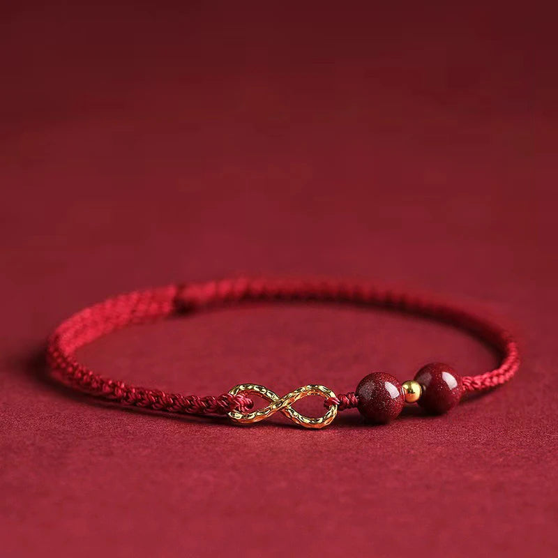 Bracciale Intrecciato Portafortuna – Infinito & Perla Rossa