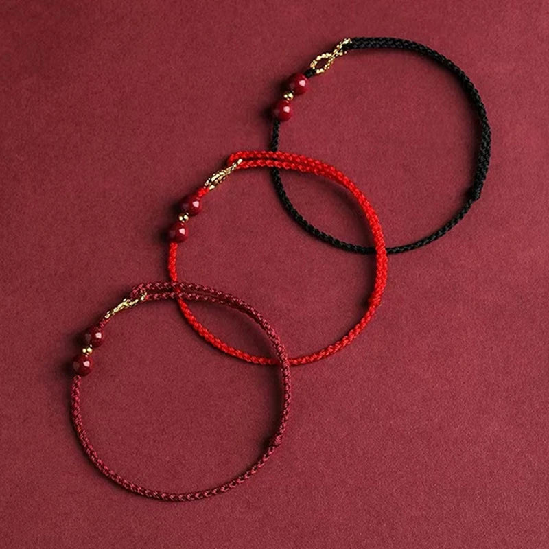 Bracciale Intrecciato Portafortuna – Infinito & Perla Rossa