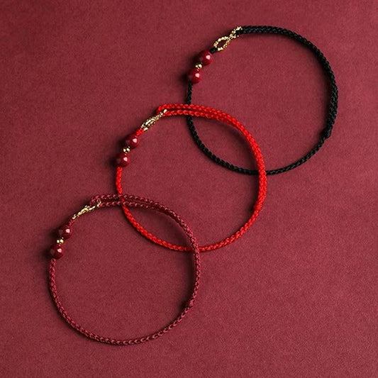 Bracciale Intrecciato Portafortuna – Infinito & Perla Rossa