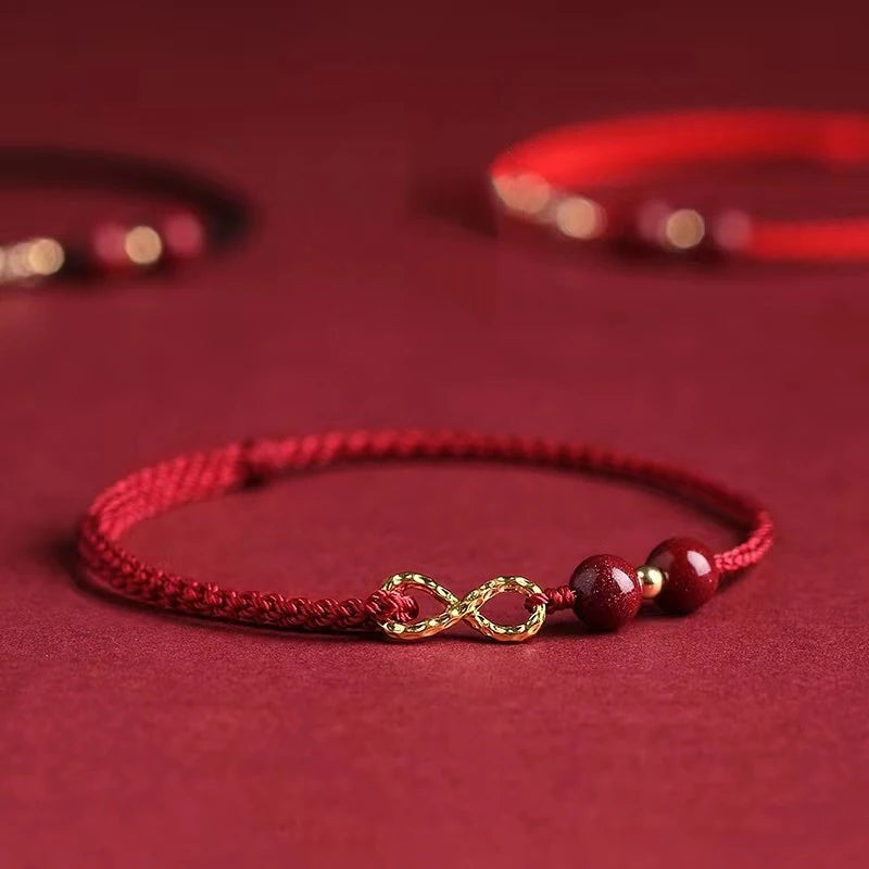 Bracciale Intrecciato Portafortuna – Infinito & Perla Rossa