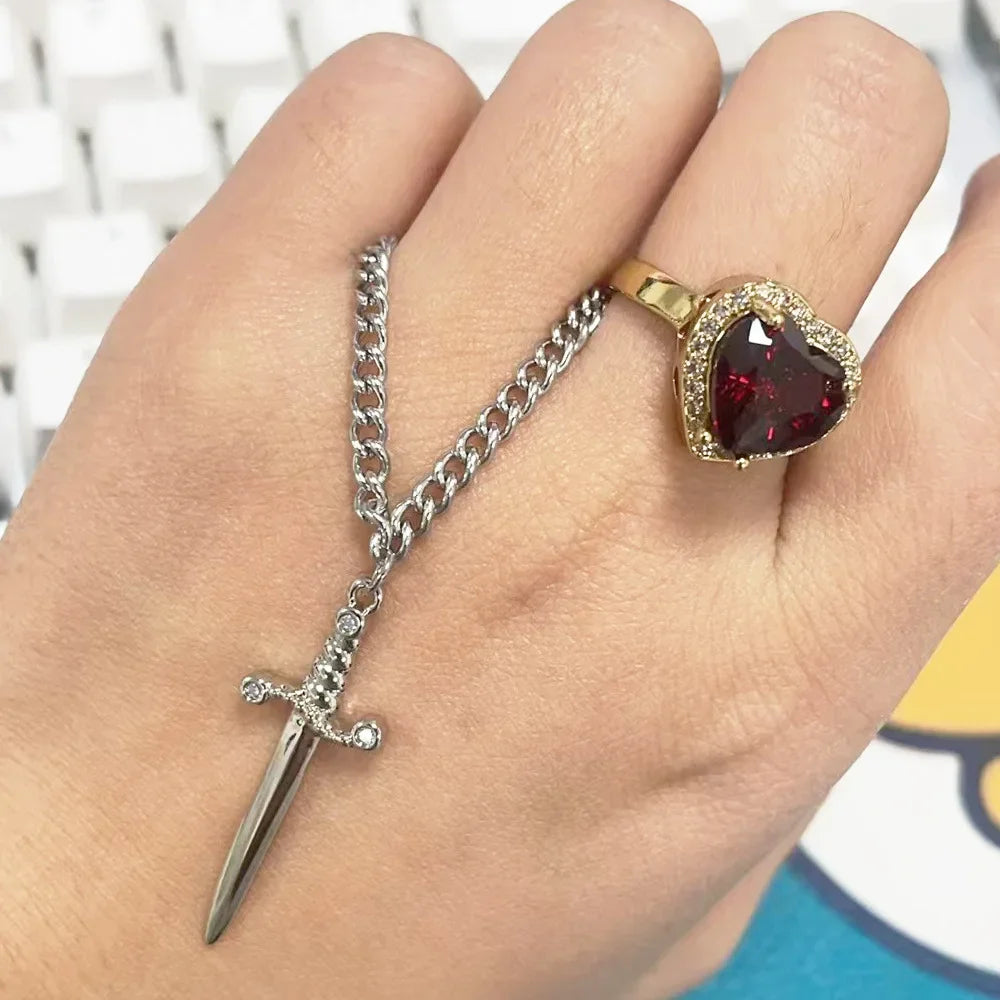 Collana Coppia Spada & Cuore – Acciaio Oro 18K | LoveDrop 2025